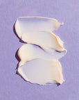 Close-up smear of skincare product. Image of REPLENIX Age Restore Retinol Eye Repair is a powerful, age-defying retinol eye treatment enriched with an advanced blend of collagen-boosting peptides proven to reduce the appearance of fine lines, wrinkles, dark circles, and puffiness under the eye.