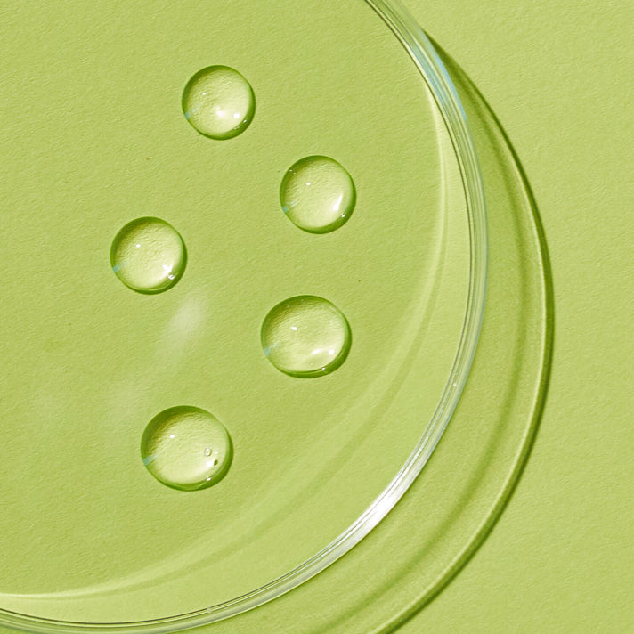 Close up droplets of REPLENIX Vitamin C Pro Collagen Serum | Discoloration | Medical Grade Skincare