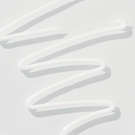 Close-up smear of REPLENIX Age Restore Brightening Moisturizer. A clinical-grade restorative brightener enriched with the age-defying properties of niacinamide that help restore skin’s youthful glow and appearance. Helping to improve skin firmness, elasticity, and texture, the advanced formula deeply moisturizes and strengthens skin’s barrier, while brightening skin.